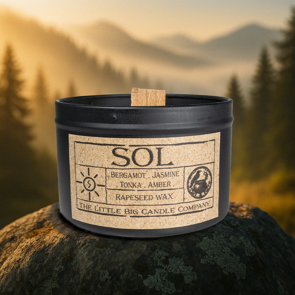 Sol candle in black matte tin, rapeseed wax, bergamot and orange blossom fragrance, bright uplifting ritual candle.