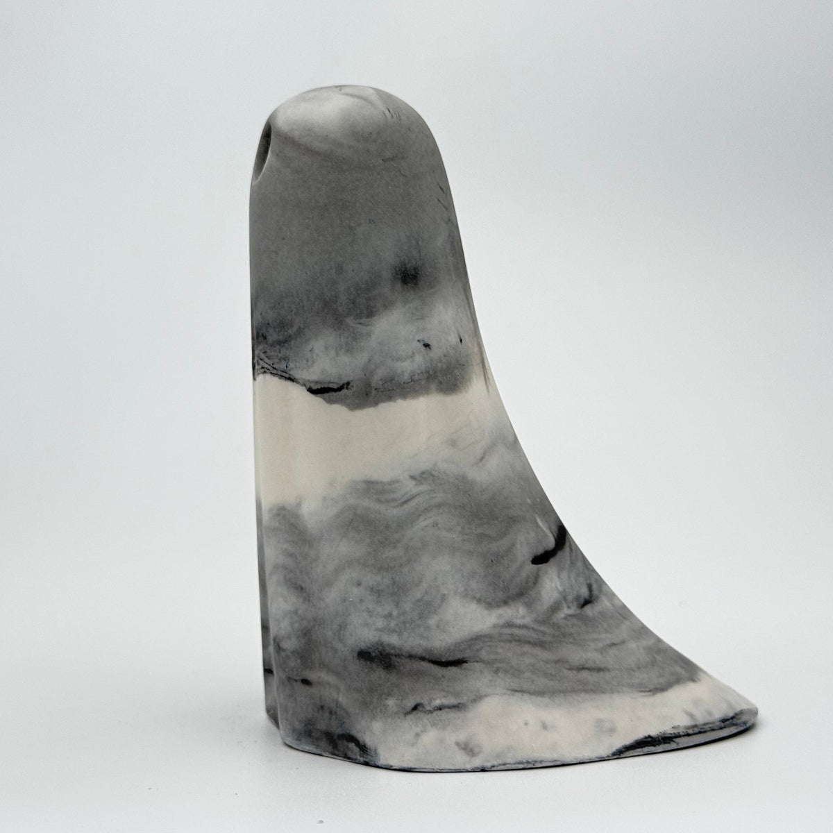 A grey and white smoky handmade ghost ornament by The Nordic Ghost Merchants. Side view