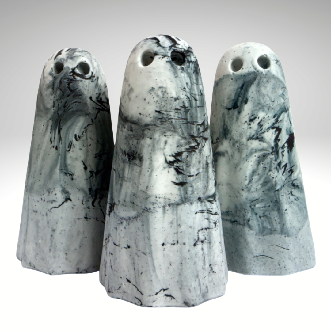 Handmade ghost figurines in stormy sea colours, created by The Nordic Ghost Merchants