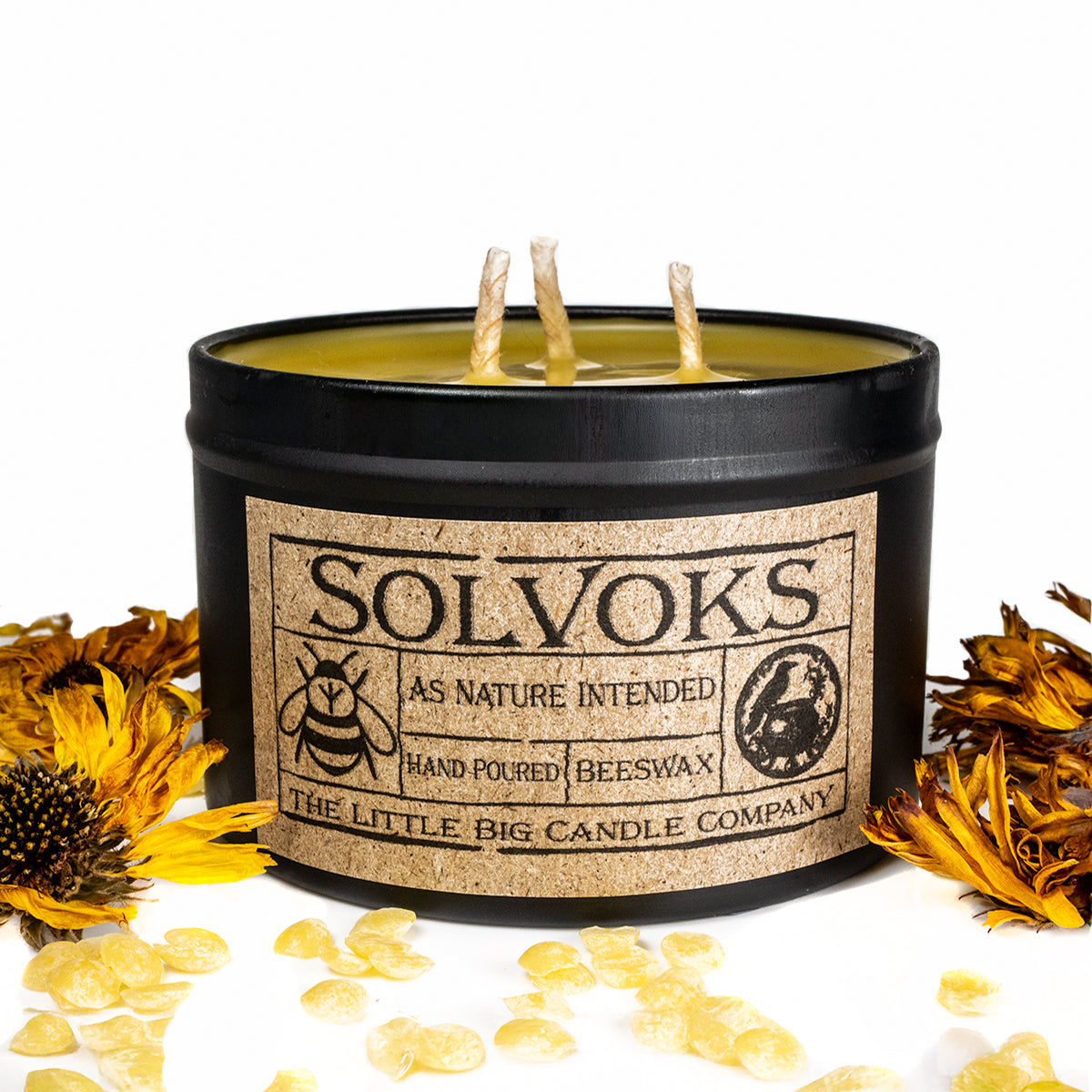 Solvoks pure beeswax candle, first flame ritual, small-batch Scandinavian apothecary candle.