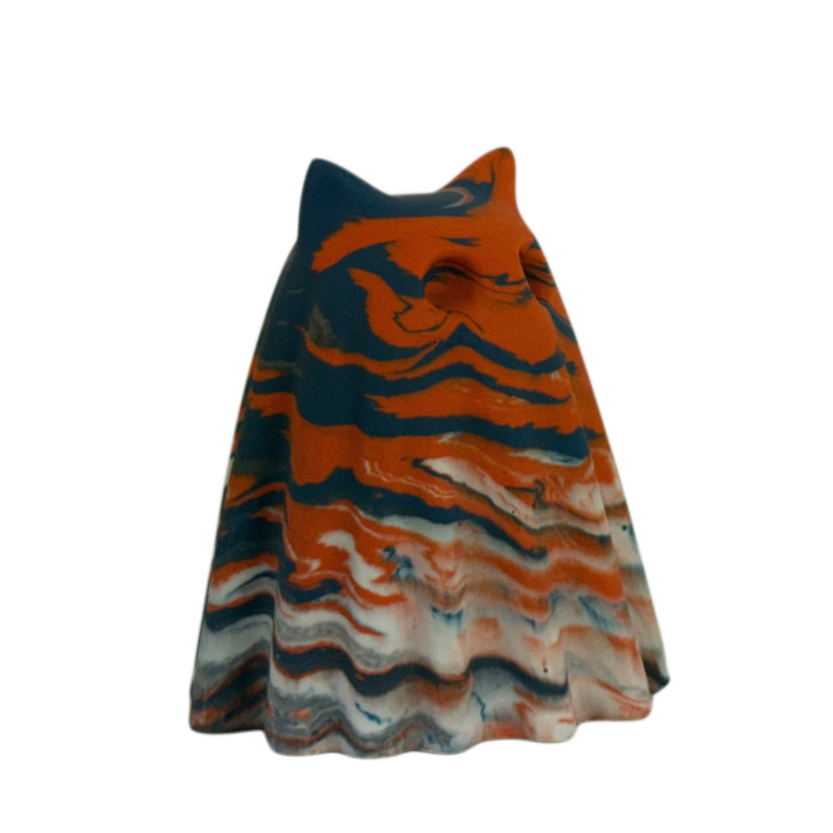 Thornby Windfall Familiar ghost figurine, angled side view showing burnt orange across the face and upper body with deep blue and cream marbling through the folds.