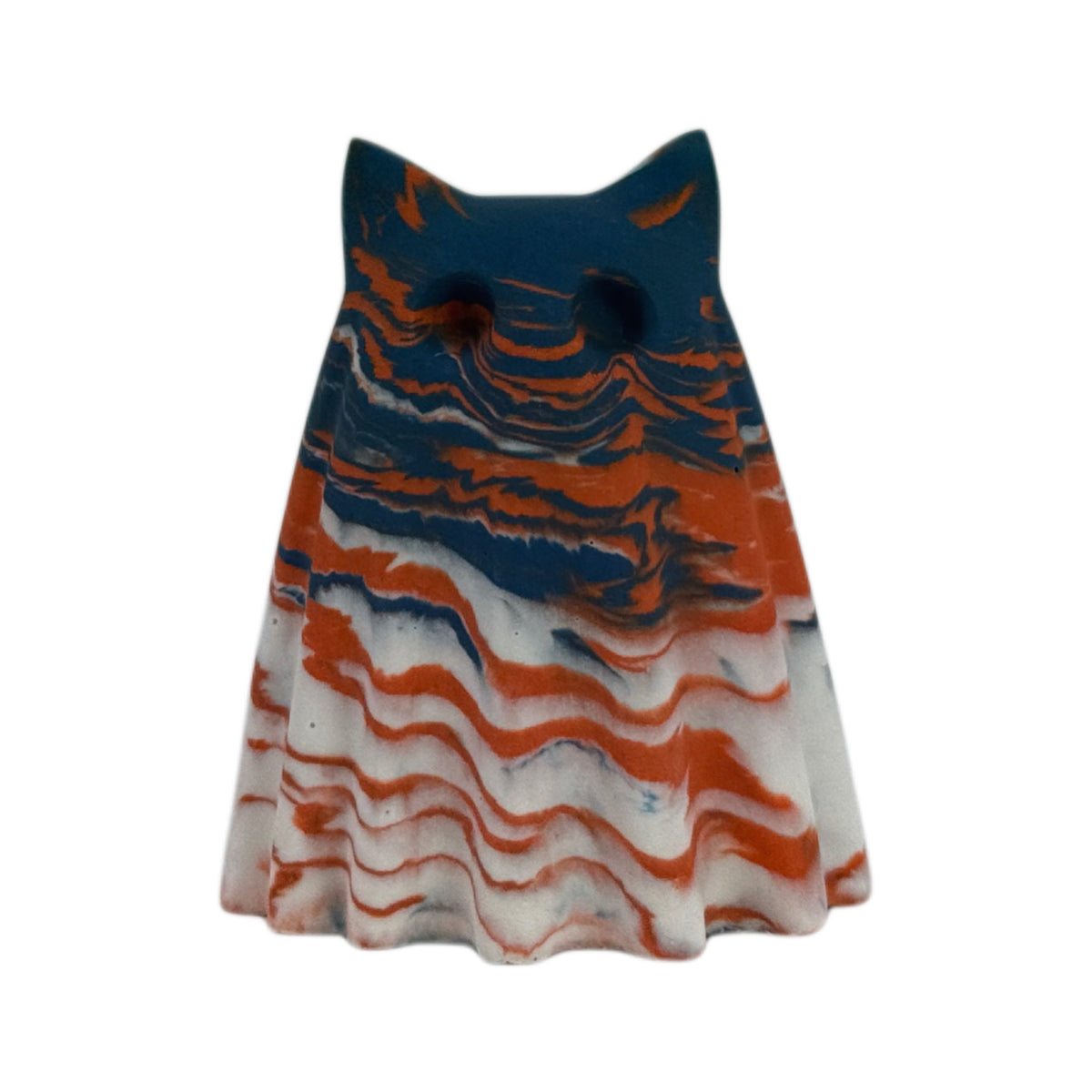 Crispin, Windfall Familiar ghost figurine in deep blue, burnt orange and old cream marbling, front view.