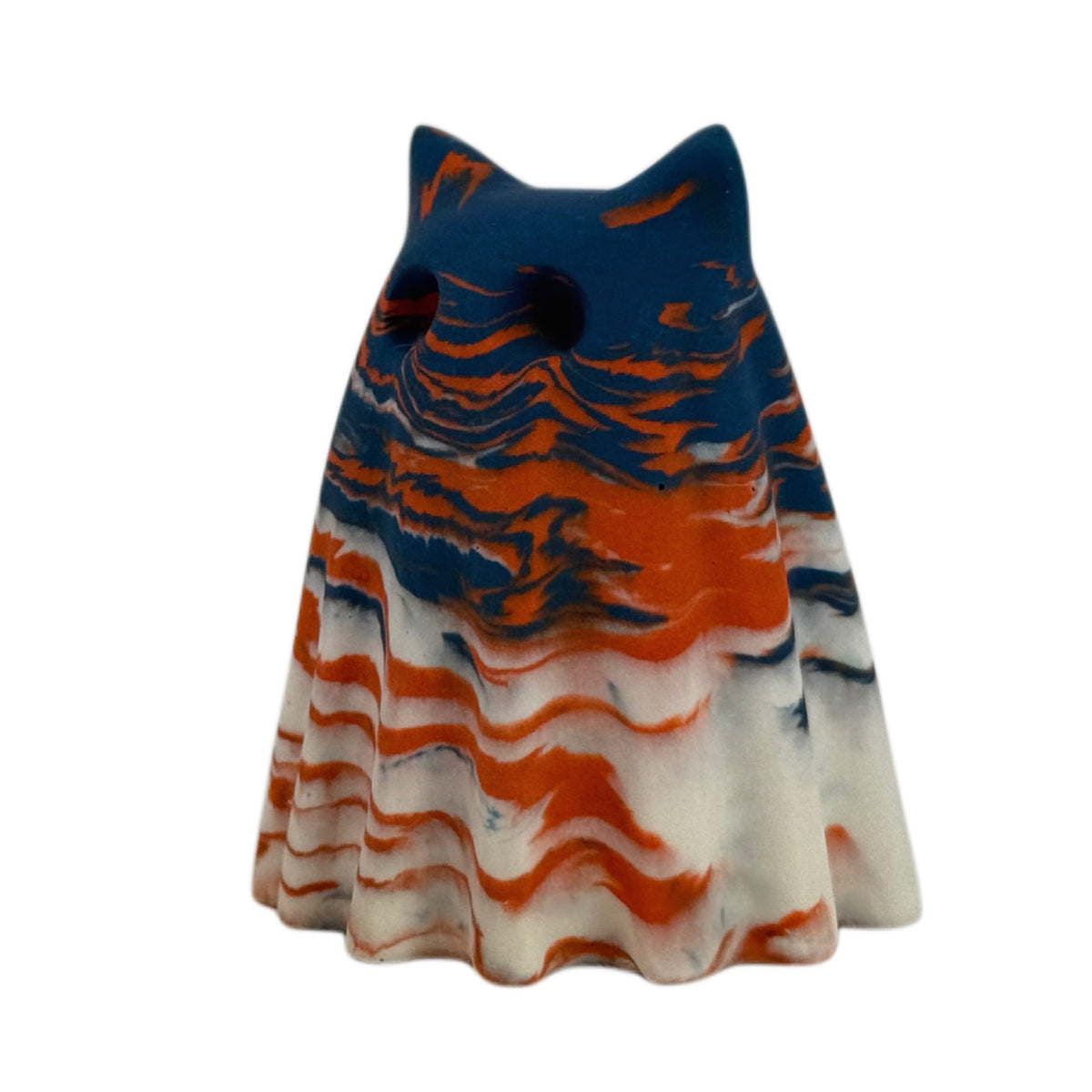 Crispin Windfall Familiar figurine, angled side view showing a deep blue crown with burnt orange and cream marbling flowing through the body.