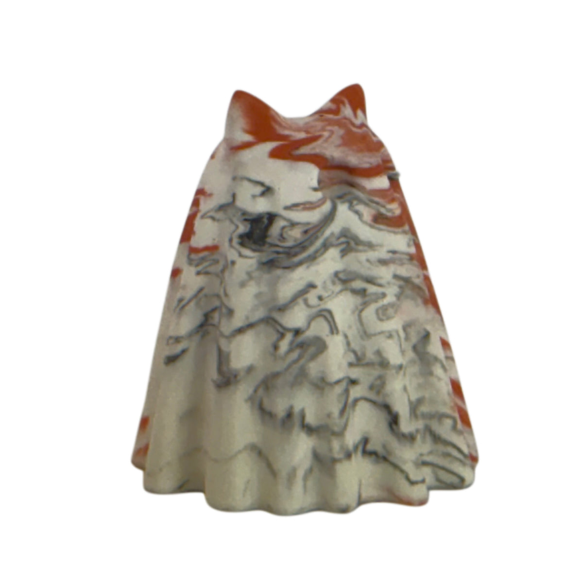 Bojangles Windfall ghost cat figurine, angled side view showing vivid burnt orange marbling across the head and right side with soft cream and charcoal swirls.