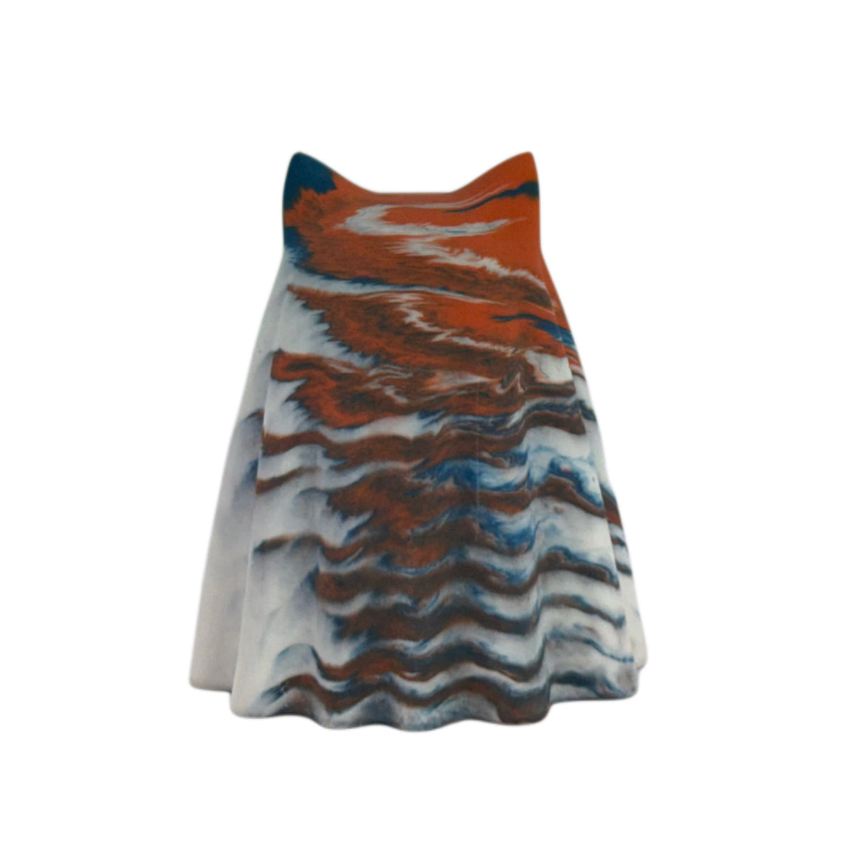 Fig Windfall Familiar figurine, rear view showing pale cream body with deep blue and burnt orange marbling along the ears and outer folds.