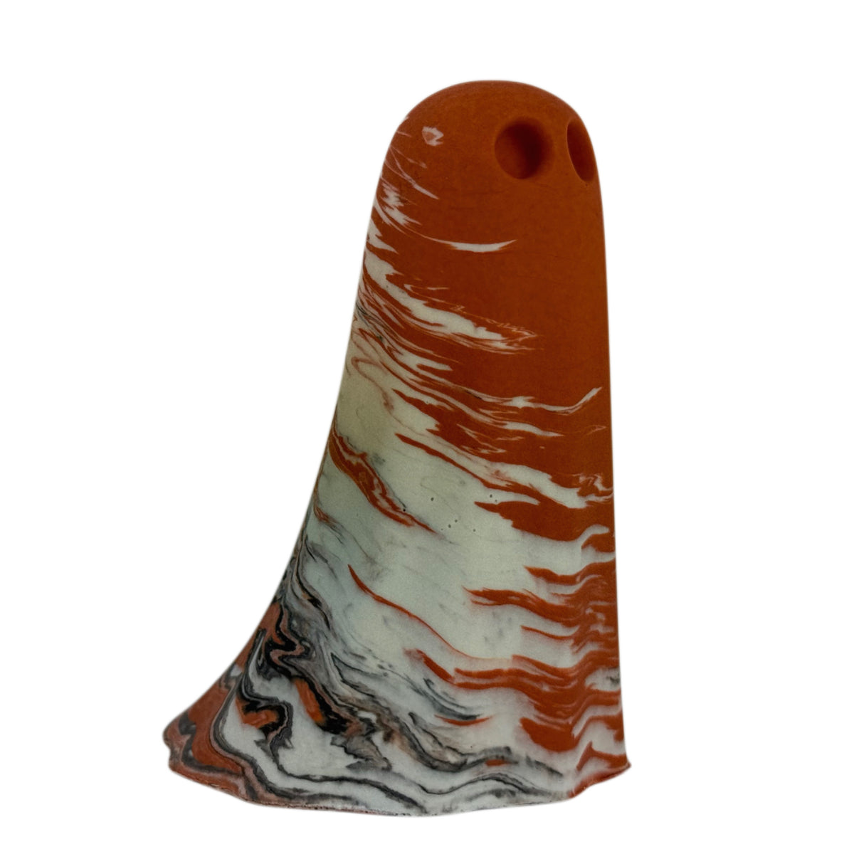 Bran Windfall Ghost figurine, angled side view showing burnt orange marbling across the crown and cream body with charcoal detailing near the base.