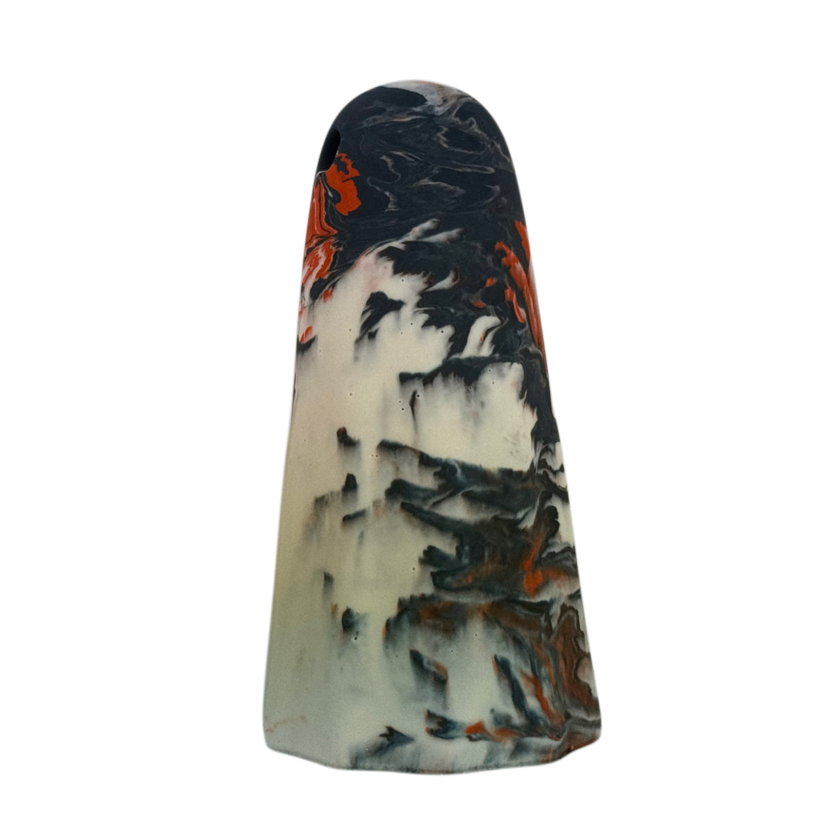 Rupert Windfall Ghost figurine, angled side view showing a dark charcoal crown with burnt orange markings over a pale cream body.