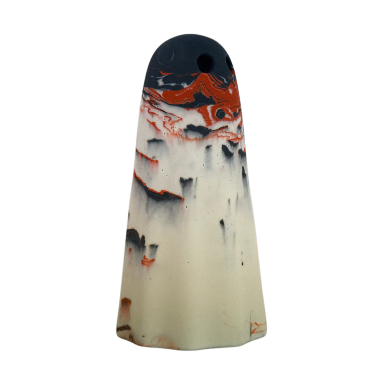 Rupert Windfall Ghost figurine, angled side view showing a dark charcoal crown with burnt orange markings over a pale cream body.