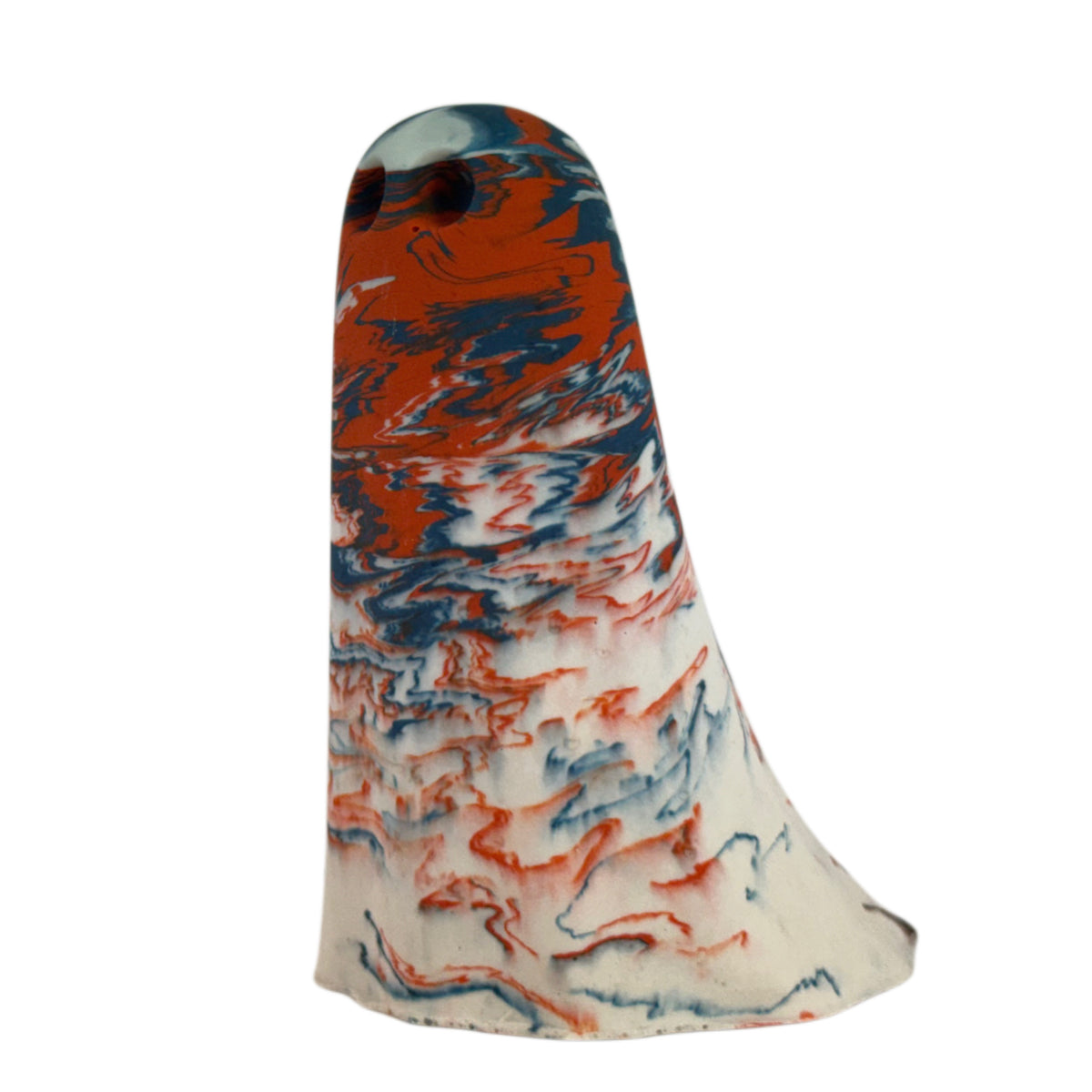 Varden Windfall Ghost figurine, angled side view showing burnt orange and deep blue marbling concentrated across the crown over a pale cream body.