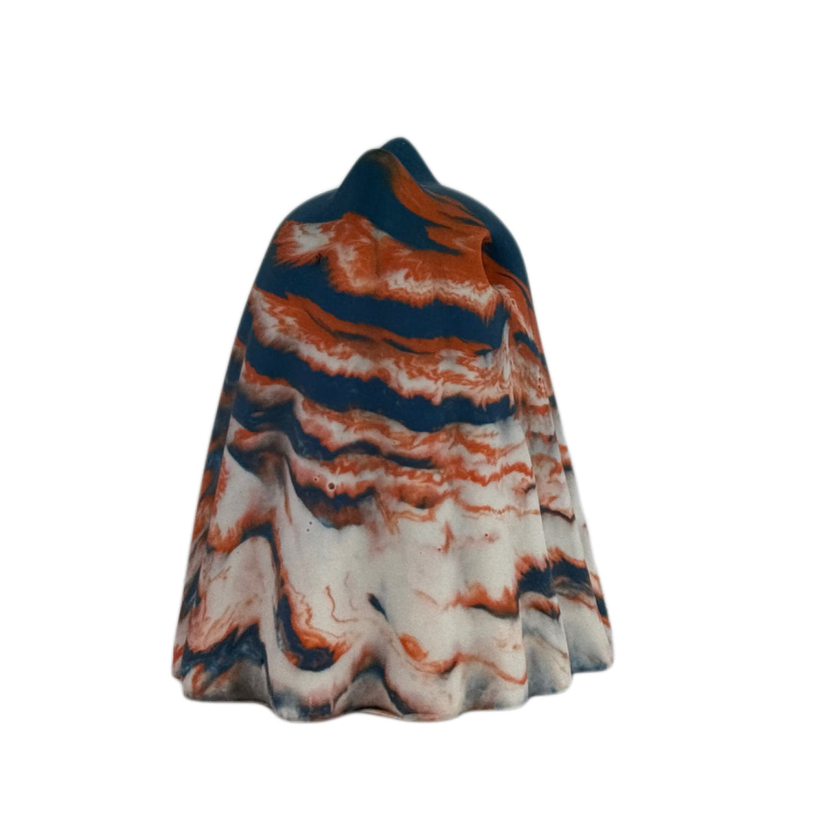 Cornelius Windfall ghost cat figurine, side view showing layered navy, burnt orange and cream marbling with soft charcoal undertones.