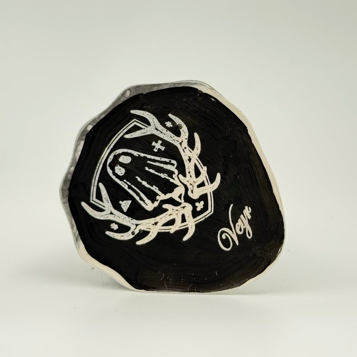 A grey and white smoky ghost figurine handmade by The Nordic Ghost Merchants. Base view