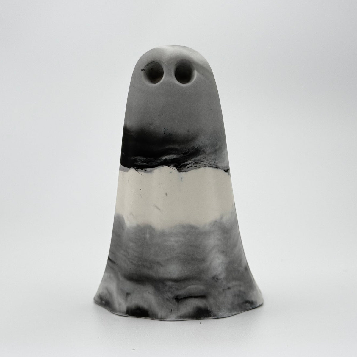 A grey and white smoky handmade ghost ornament by The Nordic Ghost Merchants. Front view