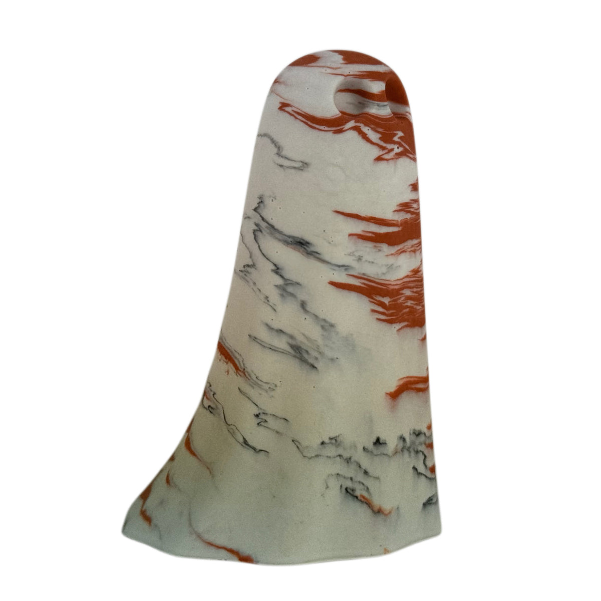 Asta Windfall Ghost figurine, angled side view showing bold burnt orange marbling across the right side and crown with fine charcoal veining near the base.